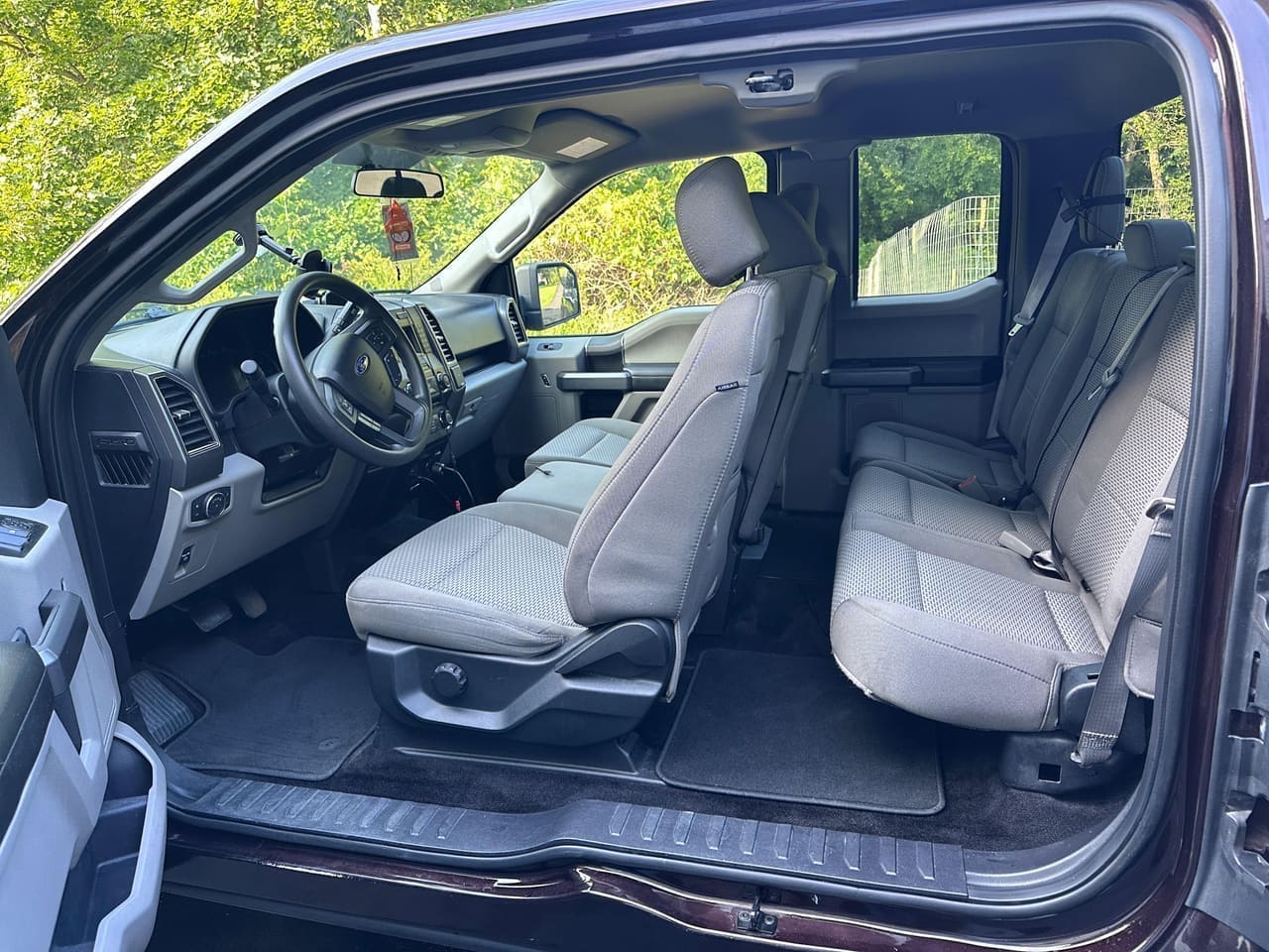 Ford F-150 truck cab AFTER full detail by Detail Jockey — vacuumed floor mats and cleaned seats, Flemington NJ