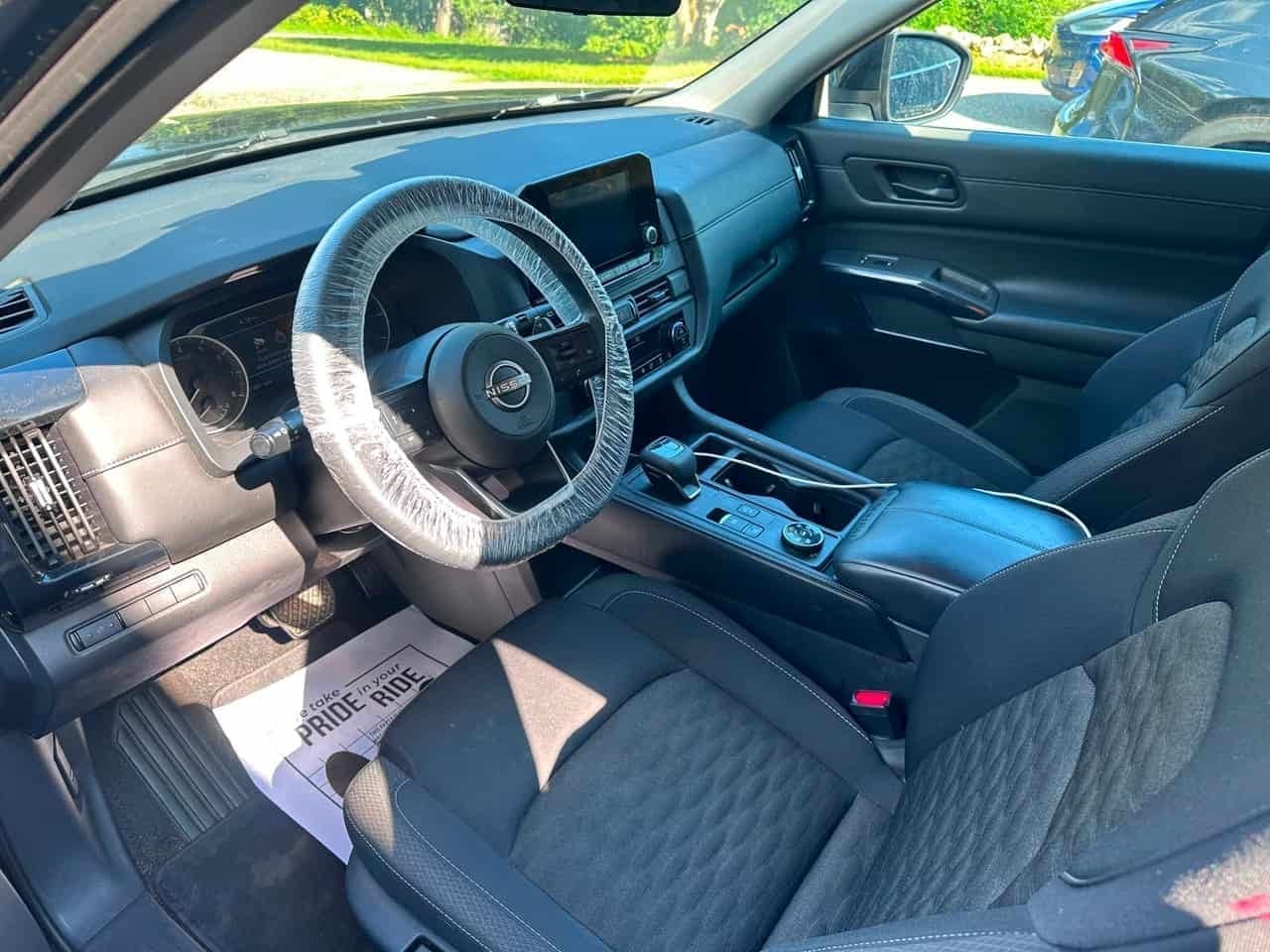 SUV interior AFTER full detail by Detail Jockey — spotless floor mats and protected steering wheel, Flemington NJ