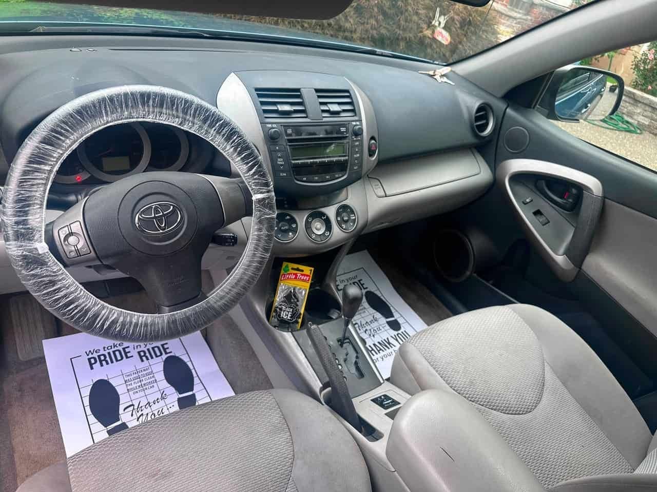 SUV interior AFTER full detail by Detail Jockey — clean dashboard and protected steering wheel, Flemington NJ