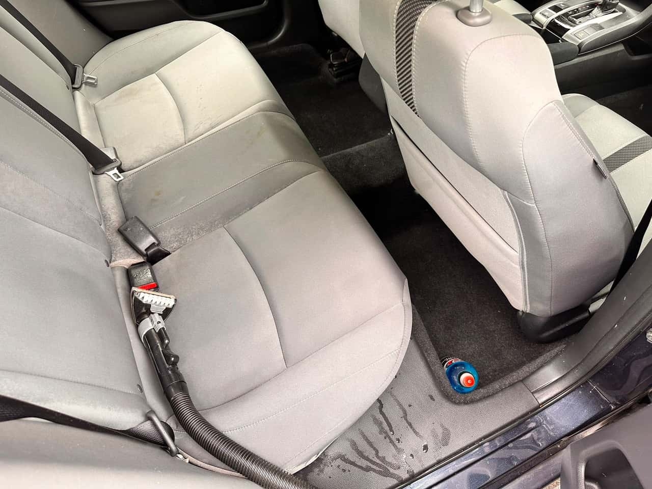 Hot water extraction process removing deep stains from car seats — Detail Jockey interior detailing Flemington NJ