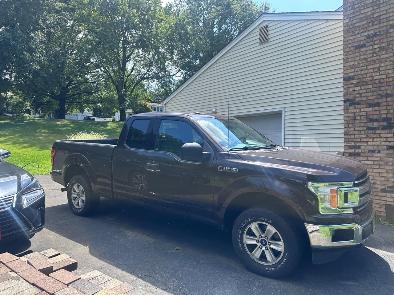 Ford F-150 truck exterior BEFORE detail — dull, hazy paint finish, Flemington NJ